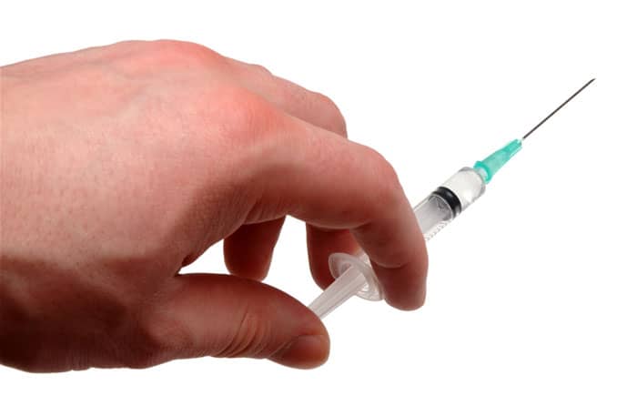 vaccines-hand-needle