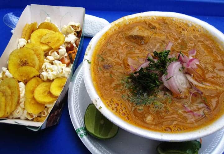 Encebollado with plaintain chips and popcorn