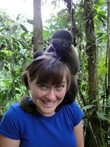 playing with monkey ecuador amazon